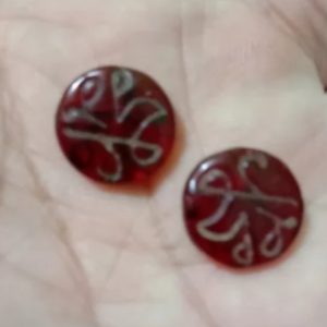 A pair of Mayangkara Pomegranate Red Stones
